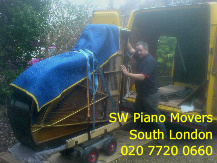 moving a 6ft grand piano SW Piano movers moving a 6ft grand piano